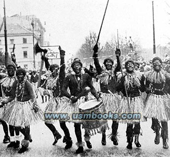 Aryans in black face, disrespectful behavior during carnival