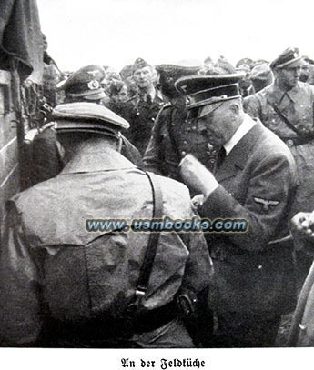 Hitler eating at a Wehrmacht field kitchen